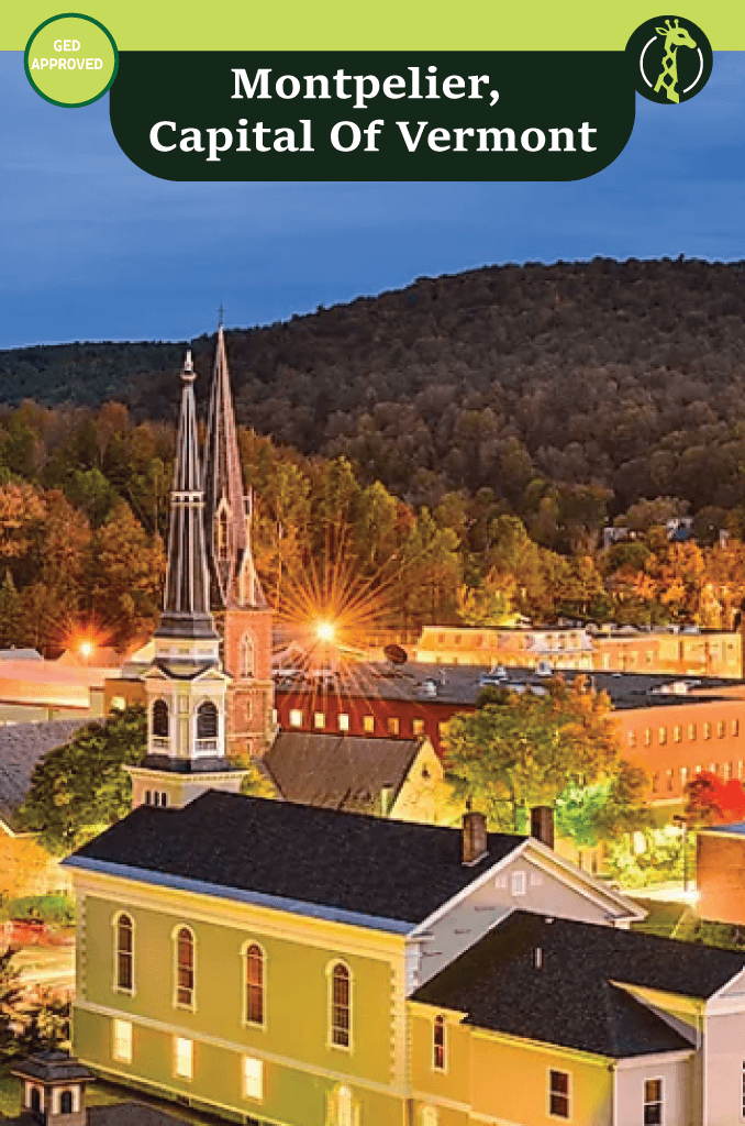The gold-domed Vermont State House in Montpelier framed by autumn hills.