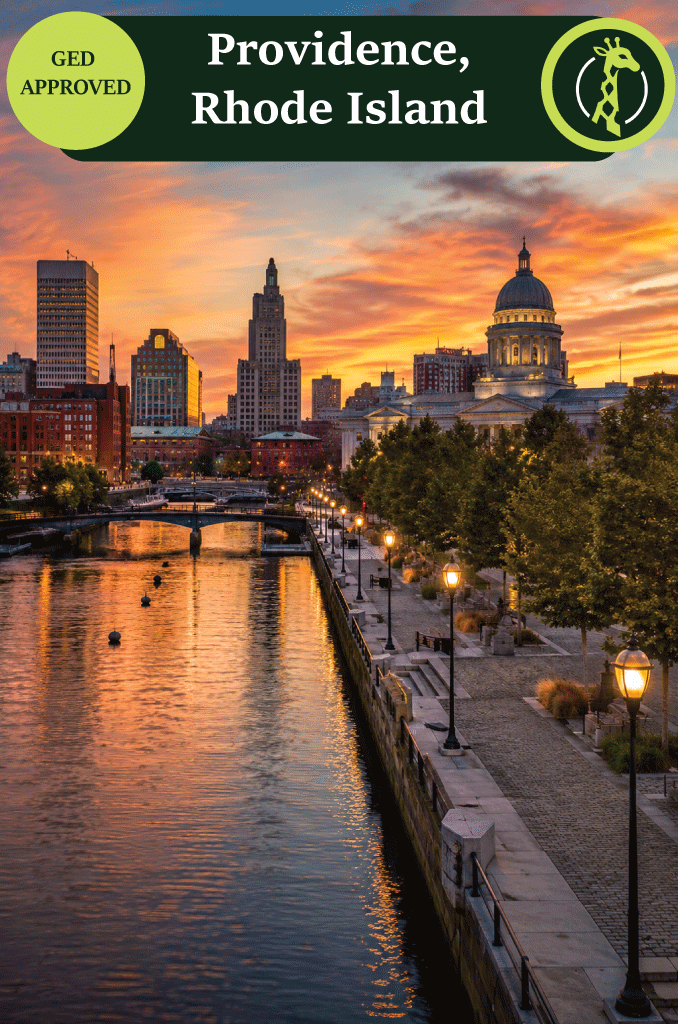 The Providence, Rhode Island skyline along the river at dusk.