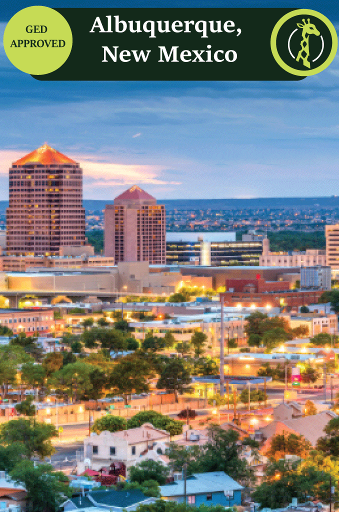 The Albuquerque skyline with the Sandia Mountains glowing at sunset.